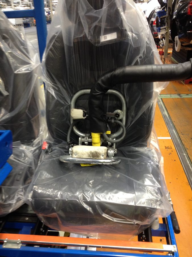 Ovity seat gripper loading a car seat
